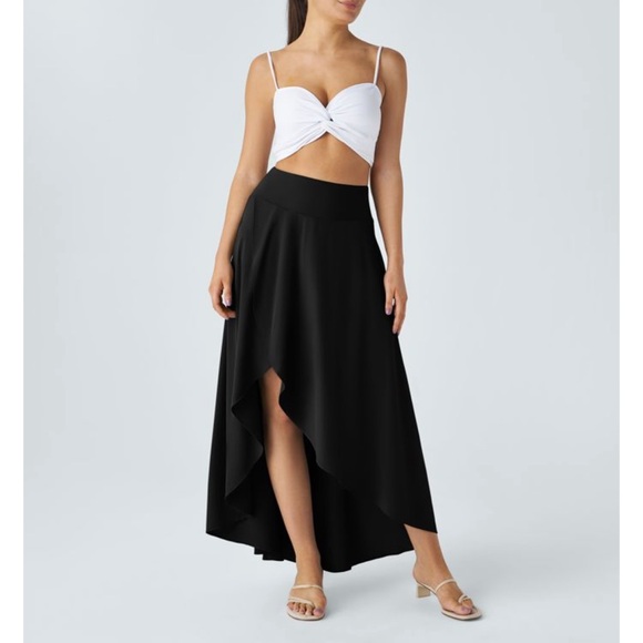 HALARA Dresses & Skirts - NWT Halara “Breezeful” Skirt. High waisted low ruffle 2 in 1 (built in shorts) M